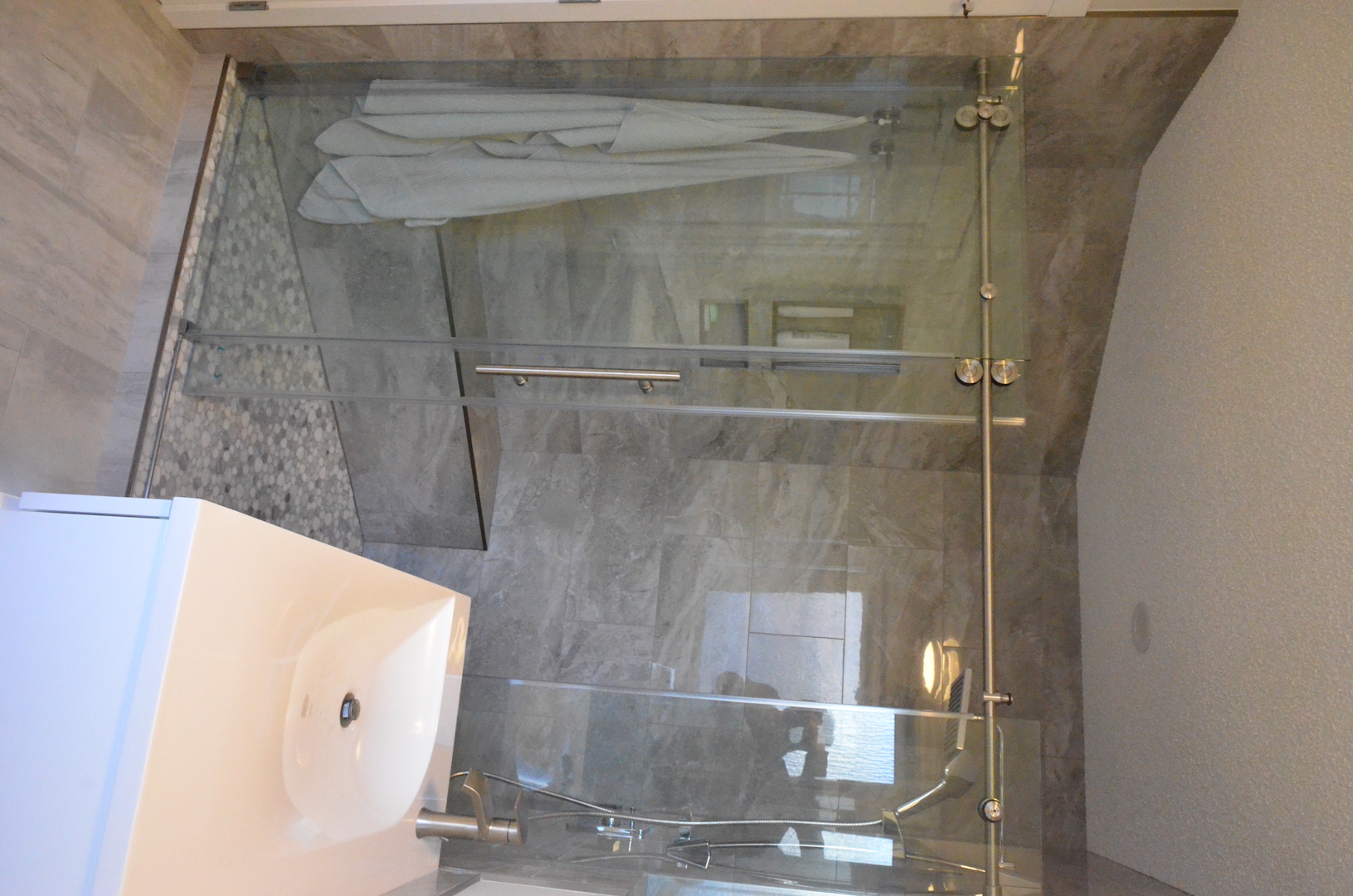 Large glass shower with niches